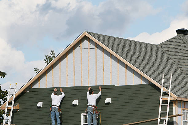 Professional Siding Installation technician working in Windsor, VA